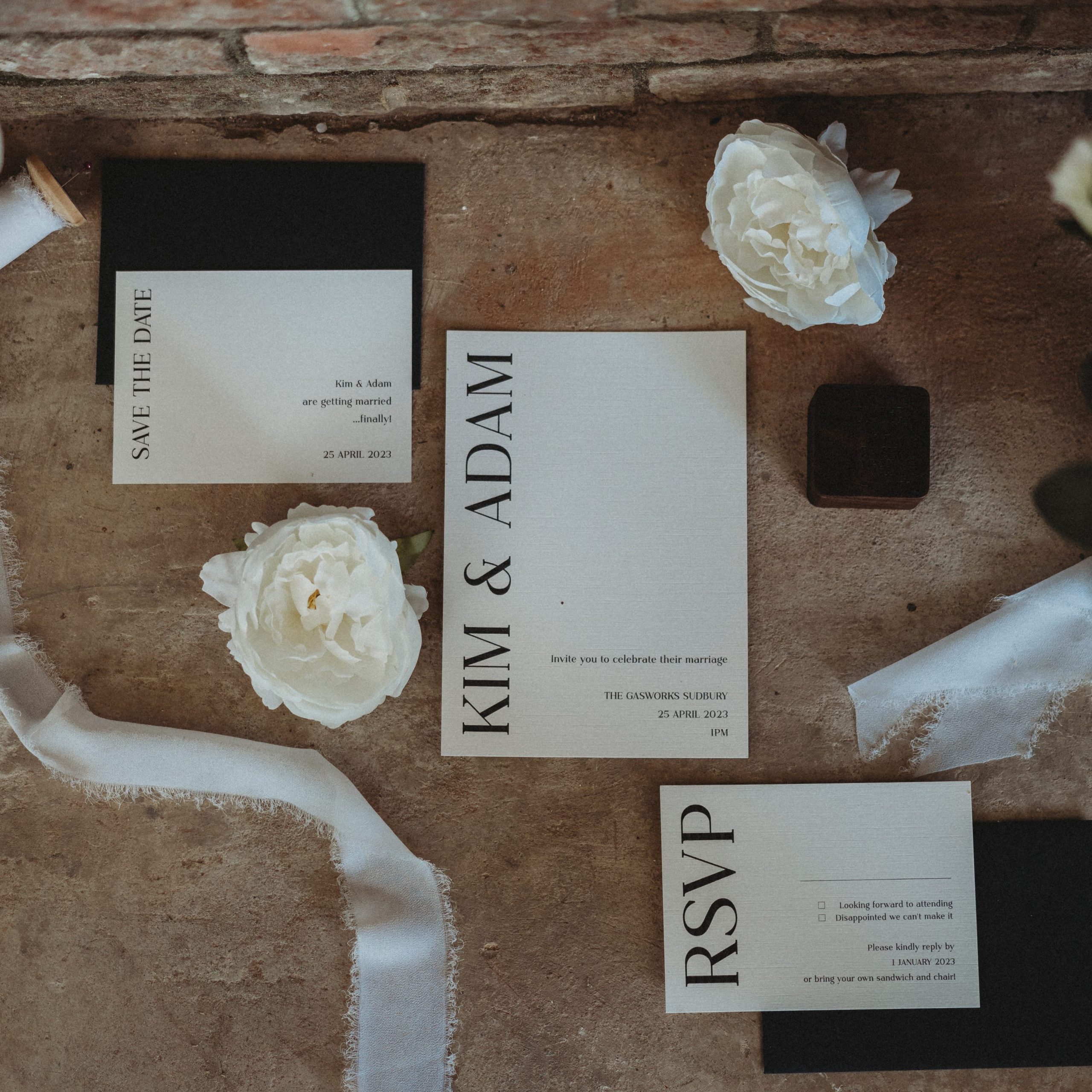 finifjing touches wedding stationery black and white wedding invites